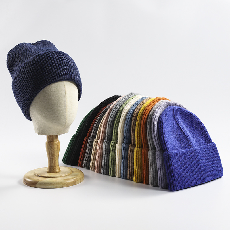 Gorro de punto de invierno Jacquard Holgado de lujo al por mayor con logotipo personalizado Bordado